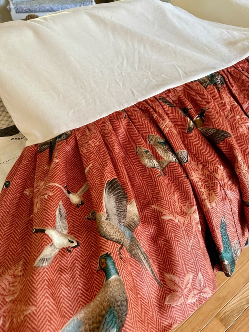Custom TWIN Bedskirt, warm rust‑red herringbone/beige - gamebird print design